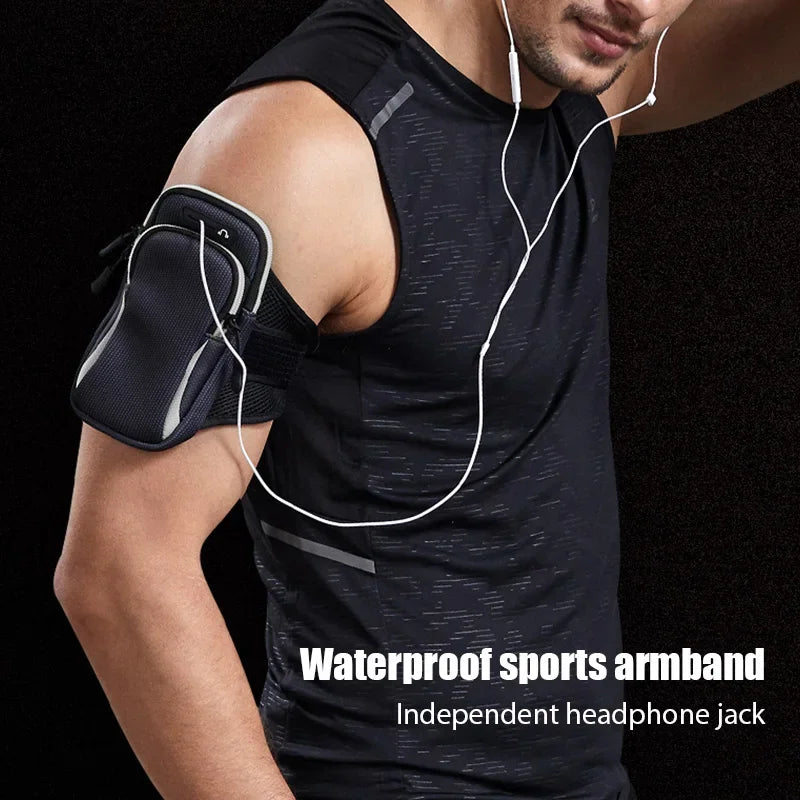 Man wearing waterproof sports armband with phone and independent headphone jack